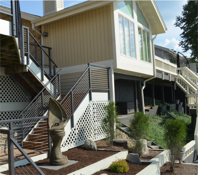 exterior of home with two story stair railing